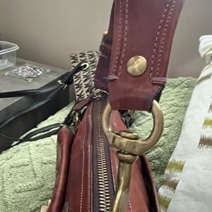 This is a coach bag that was used for one year and taken very good care of.